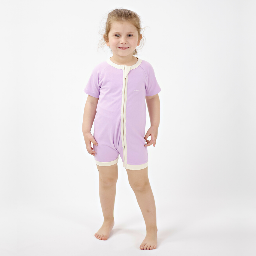 
                  
                    0.5 TOG Lilac Zee-Romper
                  
                