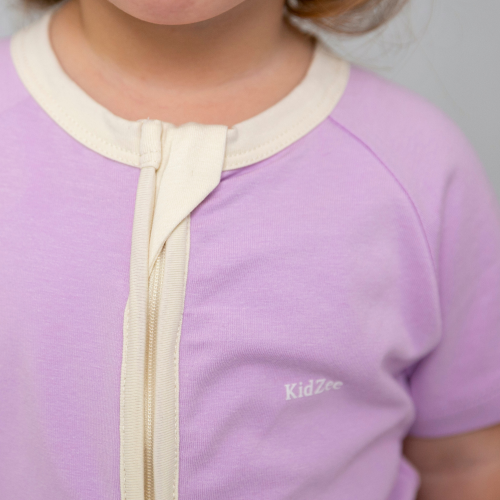 
                  
                    0.5 TOG Lilac Zee-Romper
                  
                